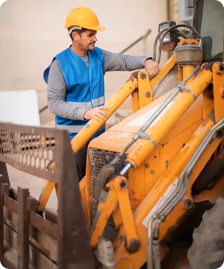 Heavy machinery and worker