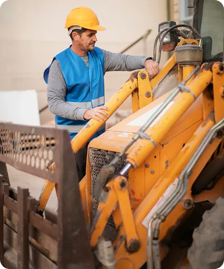 Heavy machinery and worker
